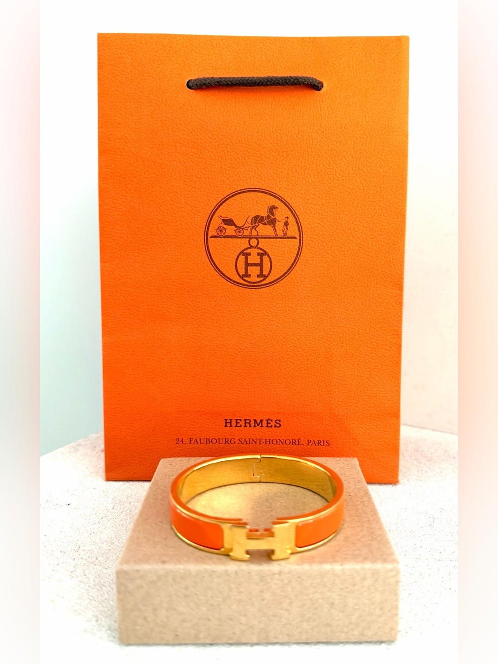 HERMÈS Clic H Orange Enamel Gold Bracelet PM Authentic w/COA